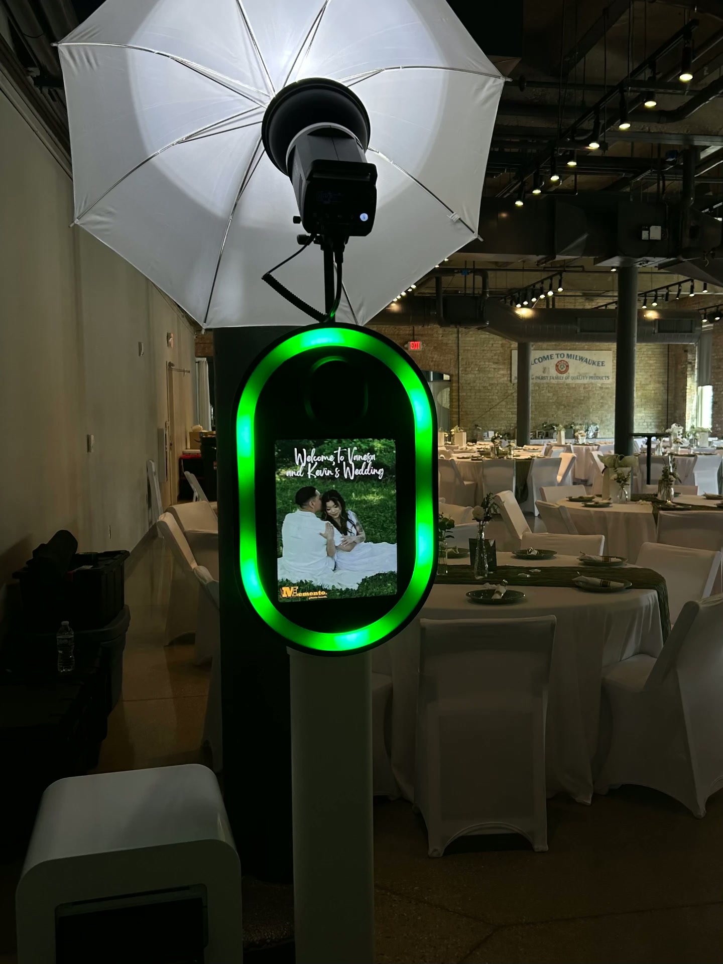 Memento photo booth with glowing green ring light at a Milwaukee wedding reception